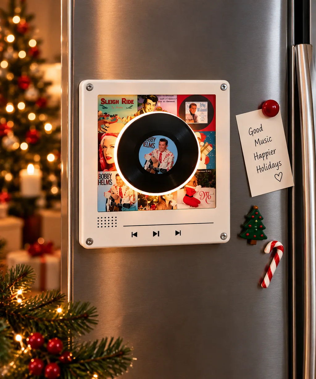 Mini vinyl player glowing on a fridge door