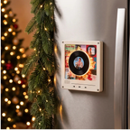 Mini vinyl player on a stainless fridge
